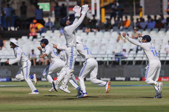 India celebrates the wicket of South African batsman David Bedingham during the second day of the second test match between South Africa and India in Cape Town, South Africa.
