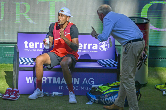 Nick Kyrgios argues with an ATP supervisor during his clash with Stefanos Tsitsipas in Halle.