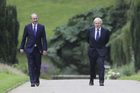Ireland's Priminister Michael Martin with Birtain's Boris Johnson, back in August 2020: both countries eschewed tough border restrictions during coronavirus surges. 