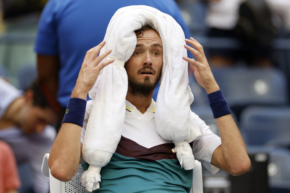 Daniil Medvedev cools down during his match against Andrey Rublev.