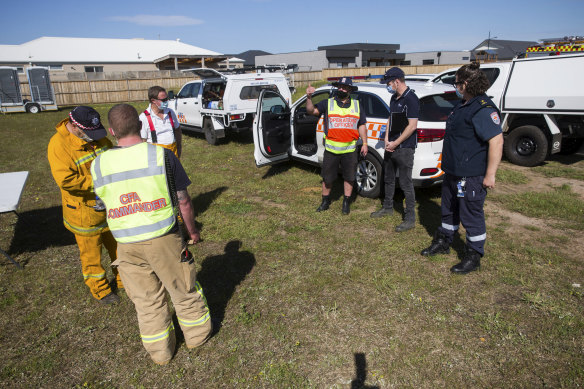 Emergency services gathered on Saturday to pump water out of the Torquay dam near houses.