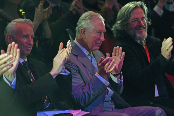 Bard-fan Charles, centre, applauds a performance at the Royal Shakespeare Company, in Stratford-upon-Avon, England, in 2020.