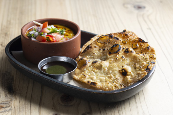 Puri flatbread crisps with chana dhal.