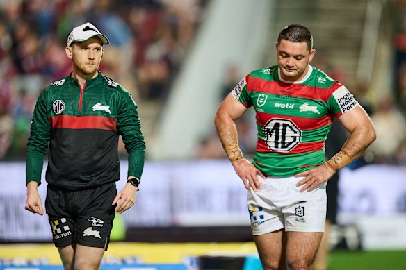 Brandon Smith limps off with a knee injury after a Matthew Lodge tackle.