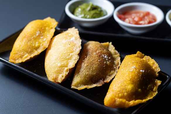 Deep-fried empanadas filled with cheese and corn.
