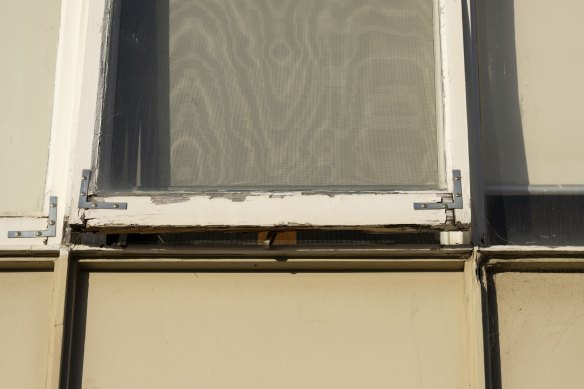 One of the block’s rotting timber frames.