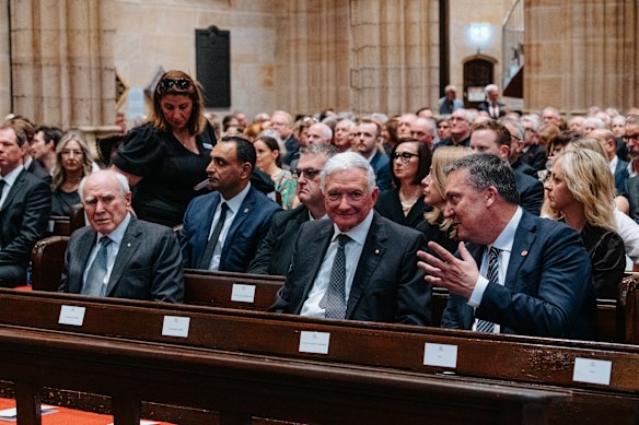 Mourners including former Australian prime minister John Howard inside St Andrew’s Cathedral.