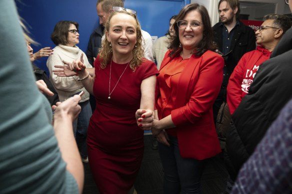 Mary Doyle (left) celebrates her victory at the Boronia Bowls Club on Saturday night.