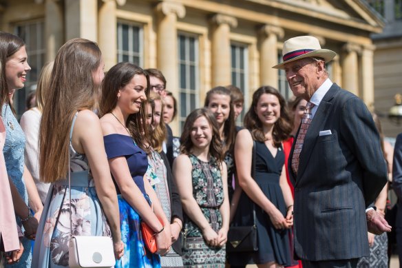 Prince Philip greets guests at the Duke of Edinburgh’s Award gold award presentations at Buckingham Palace. 