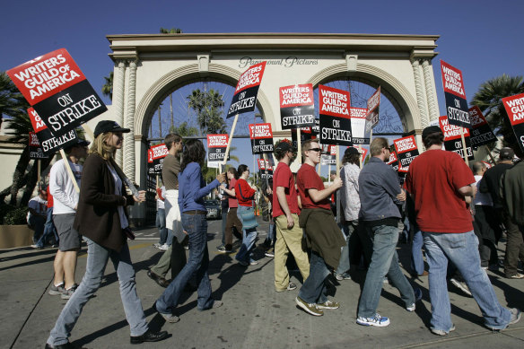 Striking writers walk the picket line outside Paramount Studios in 2007, in Los Angeles.