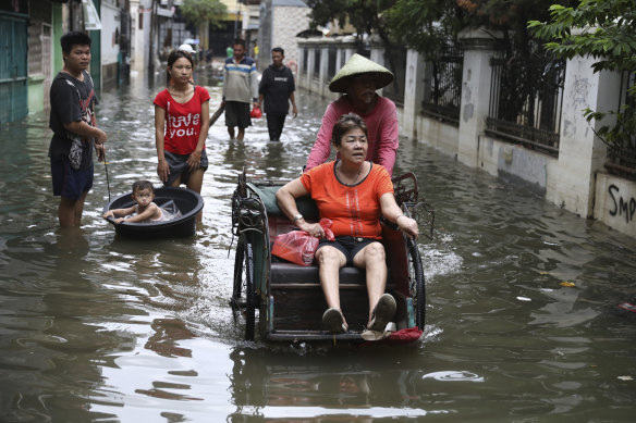 Parts of Jakarta were submerged following the rain.