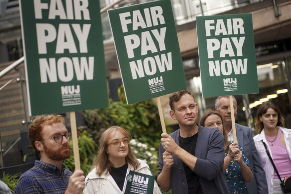 Journalists demonstrate outside the offices of Reach, in London, as they begin strike action on August 31 after talks to resolve a pay dispute broke down.