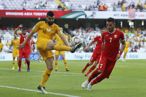 Australia's Aziz Behich and Jordan's Yousef Al-Rawashdeh: Jordan have been troublesome for the Socceroos.