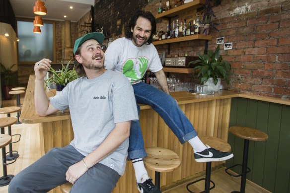 Loc Fortune (left) and Justin Lustman, owners of Chronicles Bar on Fitzroy Street, St Kilda.  Chronicles Bar is one of a handful of businesses to open on the street this year.