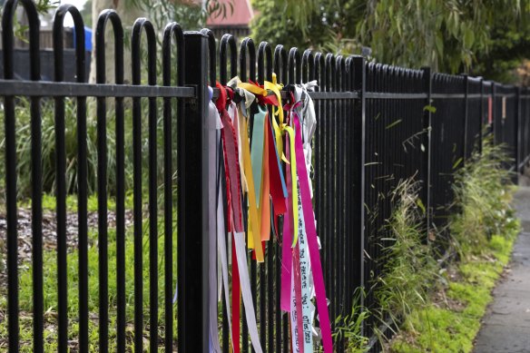 Ribbons attached to the fence at Beaumaris Primary School in support of childhood victim survivors of historical sexual abuse.