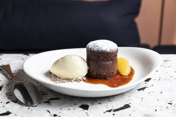 Dark chocolate budino pudding, malt ice-cream, burnt orange sauce.