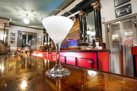 Where could you sit at the bar of El Floridita, drinking the daiquiris that were invented there?