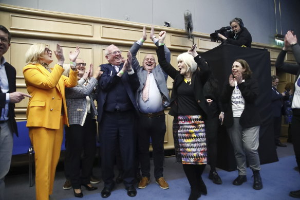 No campaigners celebrate at Dublin Castle as the result is announced.