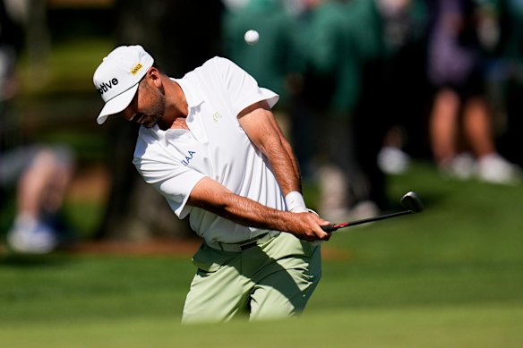 Jason Day chips to the green on the seventh hole during the first round of the Masters golf tournament at the Augusta National Golf Club on Thursday.