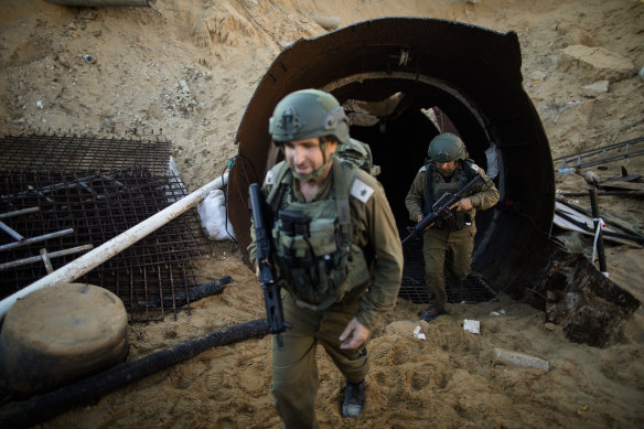 Israeli soldiers exit a Hamas tunnel found near the border with Israel in December.