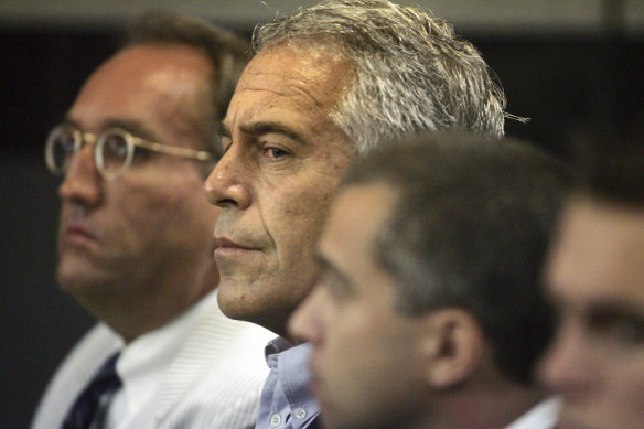 Jeffrey Epstein, centre, pictured in court in 2008.