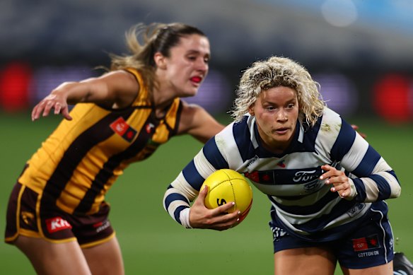 Georgie Prespakis in the thick of the action for the Cats.