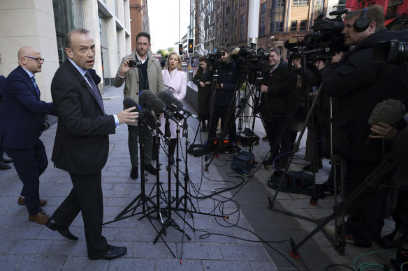 Northern Ireland Secretary Chris Heaton-Harris speaks to the media outside Erskine House, Belfast, Britain.