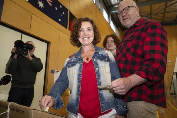Labor candidate for Dunkley Jodie Belyea casting her vote with husband Dave Glazebrook.