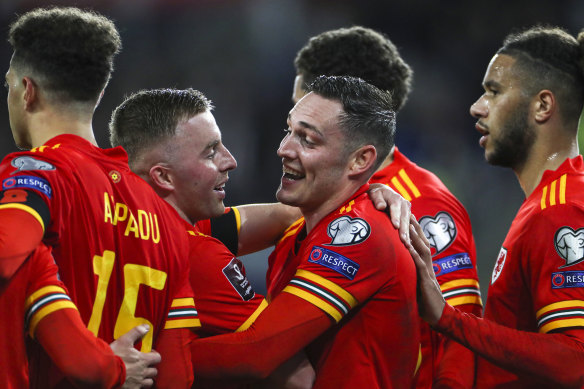 Connor Roberts and Wales celebrate goal No.5.