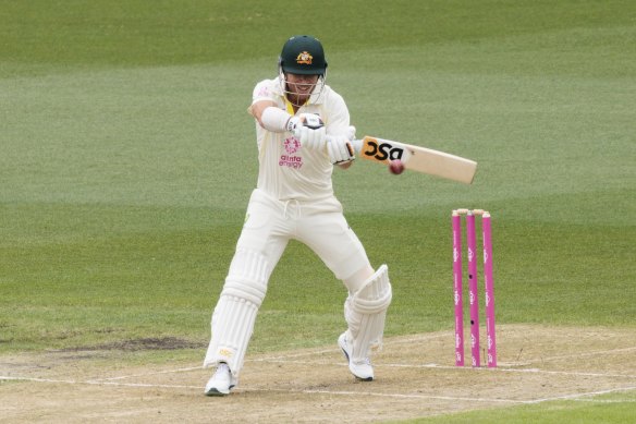 David Warner crunches a boundary on his first delivery on morning one. 