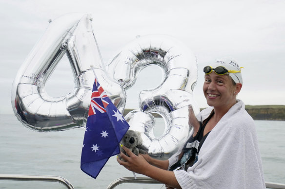McCardel celebrates after finishing her attempt to swim across the English Channel to equal the world record, currently held at 43 crossings.