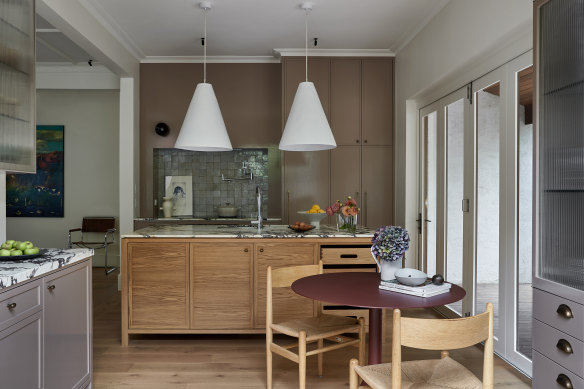 To make the kitchen feel ‘settled’ rather than spanking new, the architect included a 1920s-inspired built-in armoire.