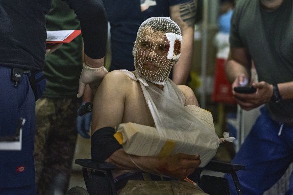 A wounded Ukrainian soldier at a medical stabilisation point near Bakhmut on Friday.