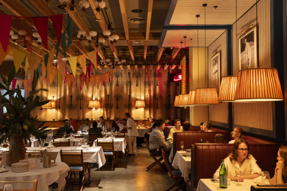 The restaurant’s interior evokes a gentlemanly sporting club, complete with Indian blockprint curtains and cricket memorabilia.