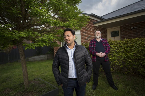 Sean Singh (left) with his neighbour Pete Schipper who performed CPR and saved his life. 