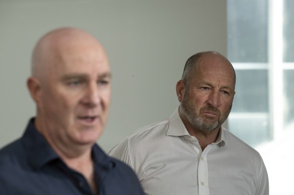 Collingwood footy boss Graham Wright (left) supported by club CEO Craig Kelly on Sunday morning.