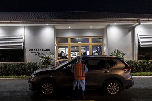 NSW Health authorities established a pop-up testing clinic in the carpark of the Crossroads Hotel on Friday afternoon. 