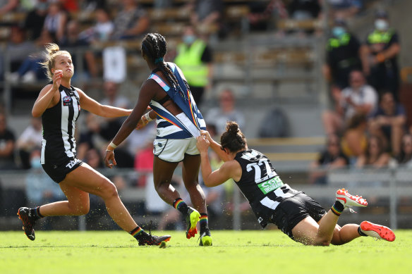 Collingwood’s Sophie Casey, right, tackles Geelong’s Stephanie Williams . 