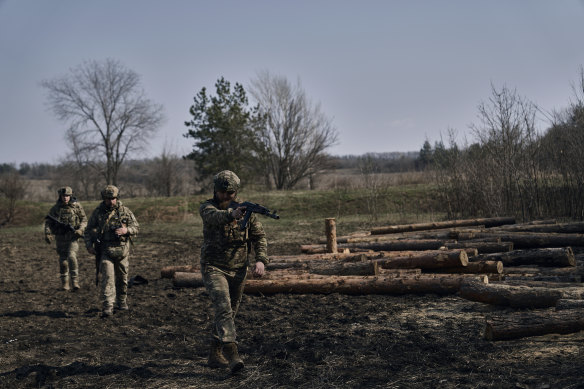 Ukrainian soldiers on the frontline during a battle with Russian troops near Bakhmut, Donetsk region, on Friday.
