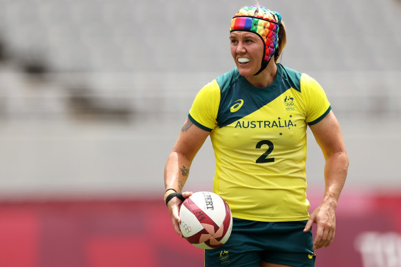 Sharni Williams with her rainbow headgear.