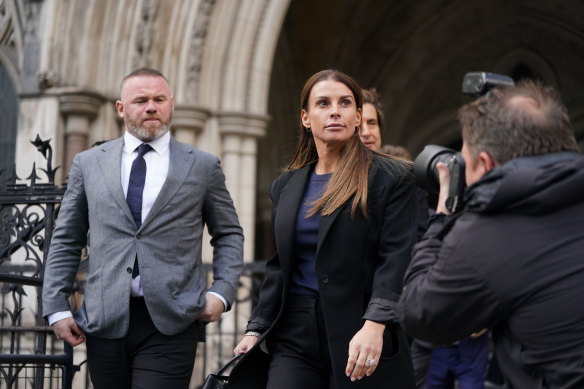Wayne and Coleen Rooney leave the Royal Courts Of Justice.