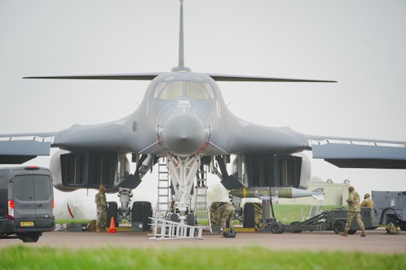 A US Air Force B-1 bomber is loaded with bombs at the Fairford air base in England on March 16.