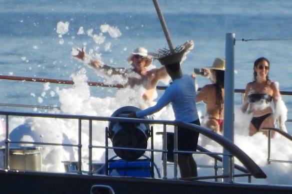 The coupled hosted the foam party aboard the Koru as protests from Venice locals forced the couple to change wedding venues.  