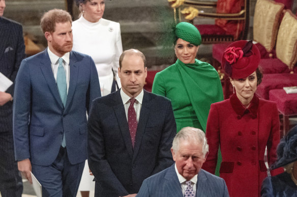 Prince Harry, Prince William, Meghan and Catherine, pictured walking behind behind Prince Charles at Westminster Abbey last year.