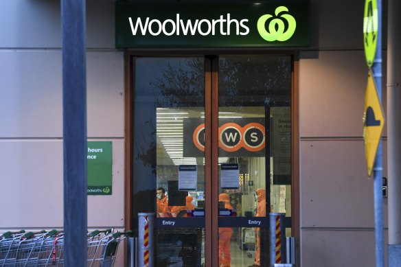 Workers prepare to deep clean a Woolworths in Epping Plaza that was incorrectly listed as a tier 1 COVID-19 exposure site earlier this month.