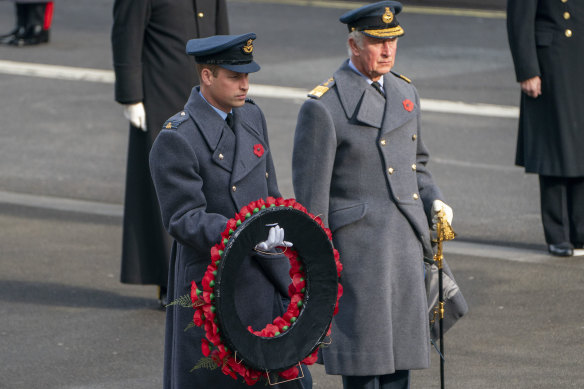 Prince William, left and Prince Charles attend the Remembrance Sunday service at the Cenotaph, in Whitehall, London, November 8, 2020.