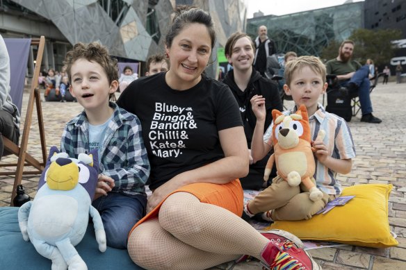Podcaster Mary Bolling with her sons Bonaventure (left) and Caspian at Federation Square.