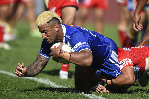 Jamayne Isaako of the Dolphins celebrates a try during the NRL Round 12  match between the Redcliffe Dolphins and the Melbourne Storm at Suncorp  Stadium in Brisbane, Saturday, May 20, 2023. (AAP