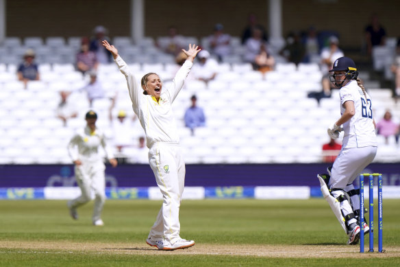 Australia’s Ashleigh Gardner celebrates after taking the wicket of England’s Danni Wyatt.