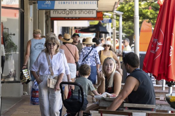 People shopping and eating on The Terrace in Ocean Grove.